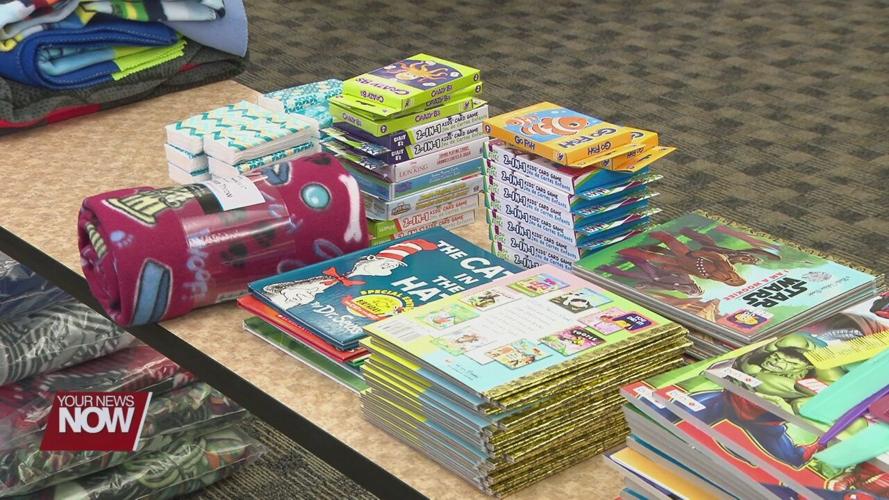 Backpacks filled with multiple items to be given to children entering foster care