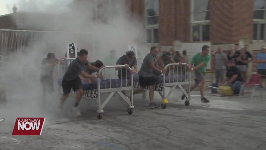 Racing in hospital beds for a good cause at the Moon Fest