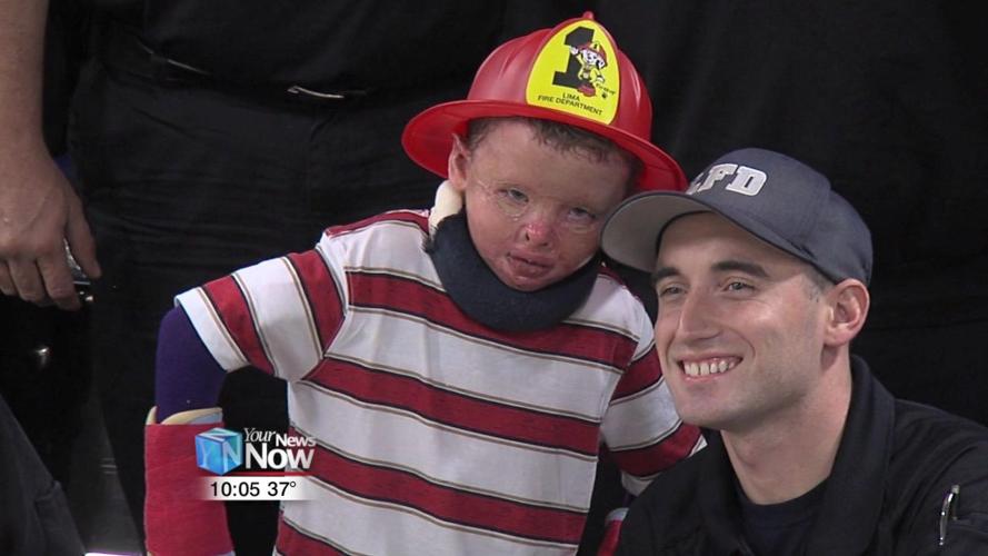 Lima Fire Department welcomes home Lima boy they rescued from fire 2.jpg