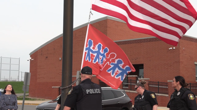 Allen County marks Child Abuse Prevention Month with memorial flag raising
