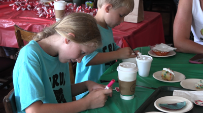 Festive spirit fills The Meeting Place on Market for its annual “Christmas in July”
