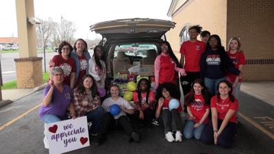 Perry students collect donations for Spread the Love