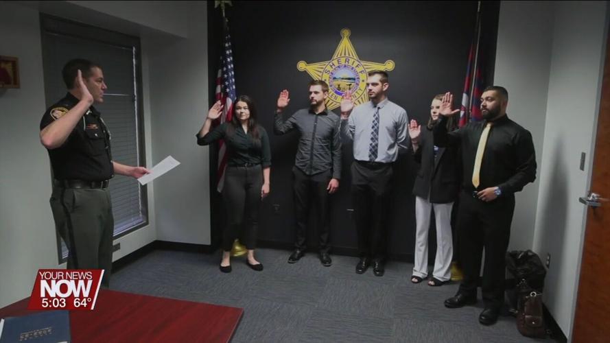 Five officers are sworn in as the first class of the new cadet program