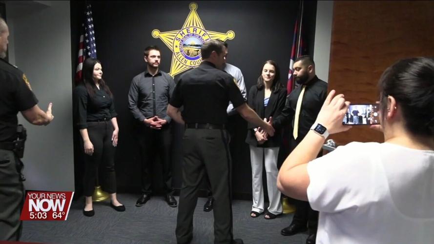 Five officers are sworn in as the first class of the new cadet program