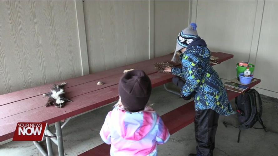 Johnny Appleseed teaches kids about camouflage in "Stories in the Woods" program