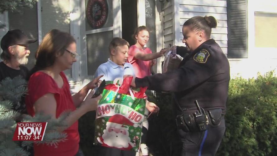 Lima students surprised with gifts and more from Santa and the Fraternal Order of Police
