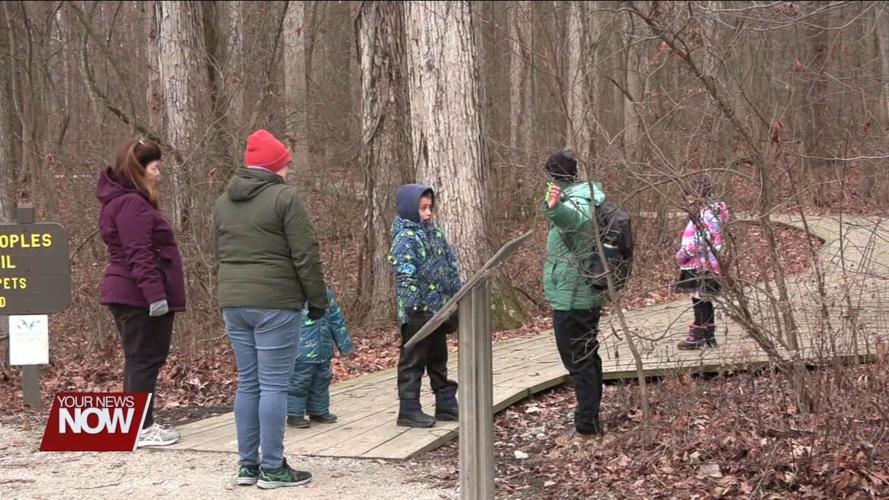 Johnny Appleseed teaches kids about camouflage in "Stories in the Woods" program