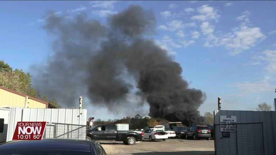 Multiple departments battle blaze at Perry Auto