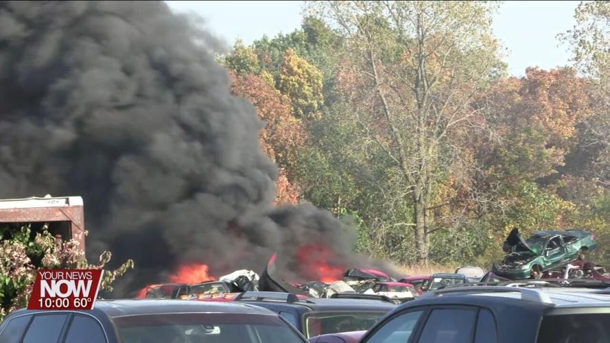 Multiple departments battle blaze at Perry Auto