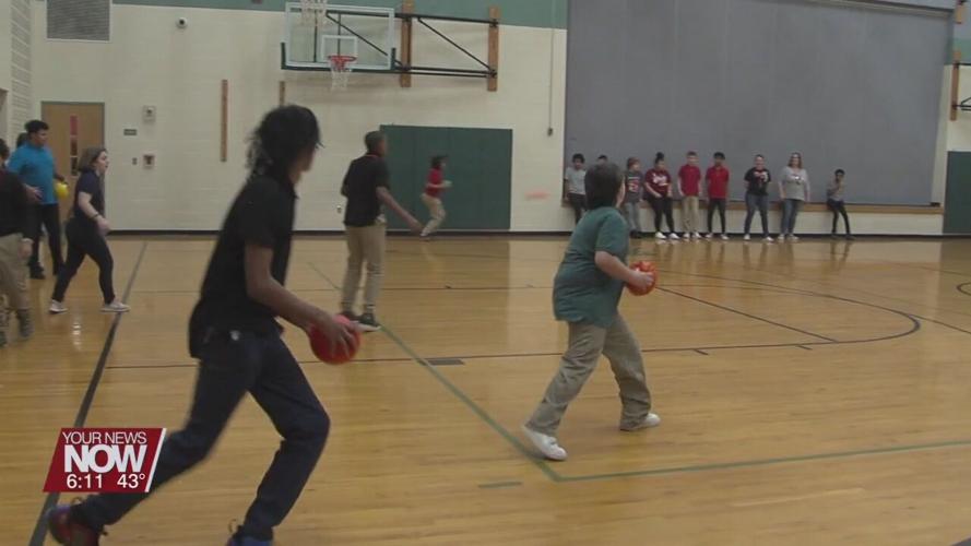 Students at Lima West Middle School playing dodgeball to help a student at Bath Elementary School