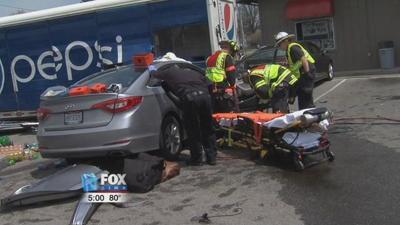 *Updated* Car collides into a Pepsi truck outside The Pony Keg
