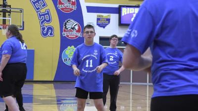 Special Olympics athletes face Auglaize County Sheriff's office in community basketball game