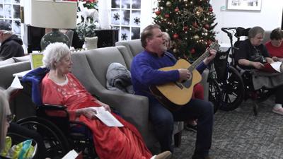 Ministry of Angels brings caroling and gifts to Kessler Estates