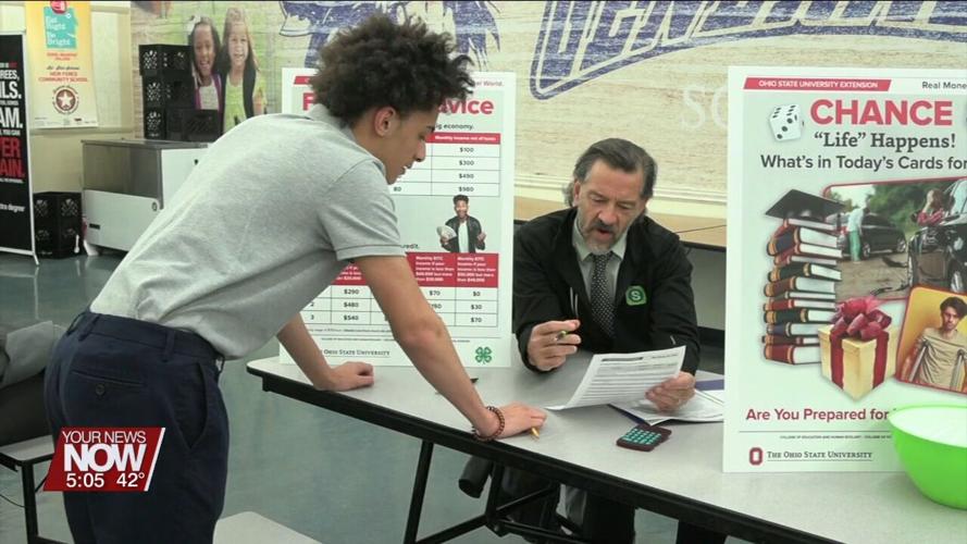 Heir Force Academy students learn about money management with Real Money Real World program