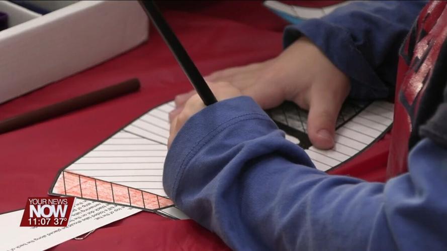 Early education students practice teaching at Holiday Family Learning Night