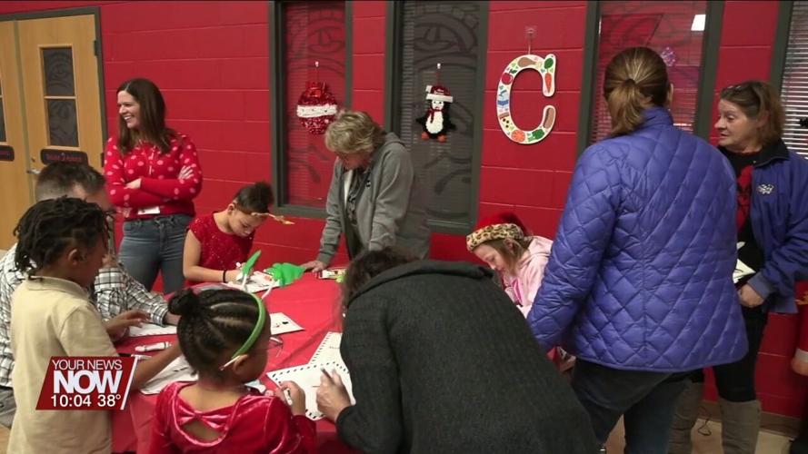 Kids Hope USA mentors throw holiday party for Unity Elementary School students