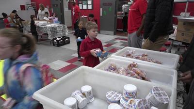 Spartan Basketball Team Welcomes Heritage Students as Kings and Queens