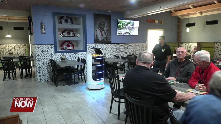 Mexican restaurant in Lima entertains and serves guests with unique electronic waiter
