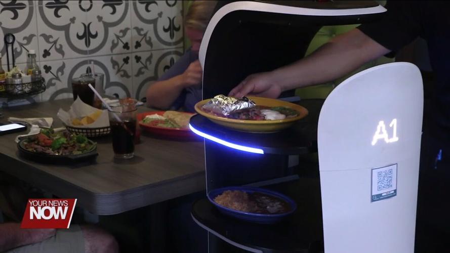 Mexican restaurant in Lima entertains and serves guests with unique electronic waiter