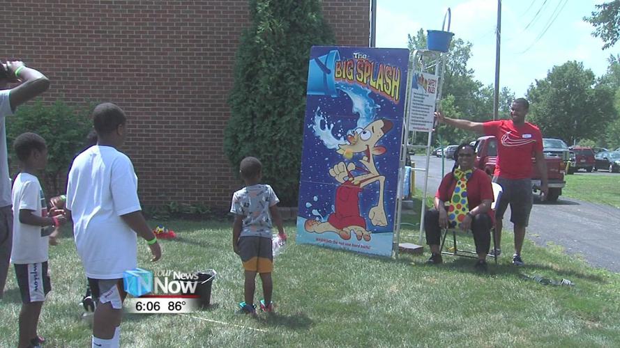 Lima church hands out 200 backpacks filled with school supplies1.jpg