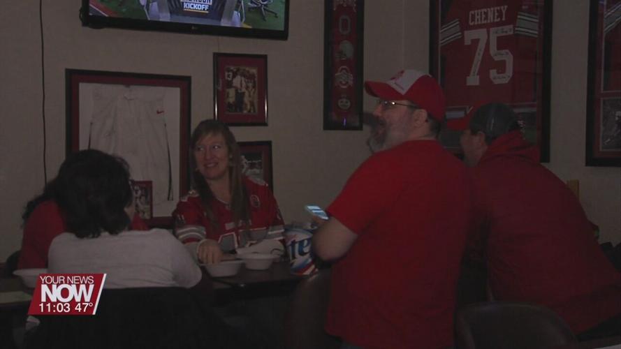 Lima residents gather to watch The Game and show their scarlet and grey pride