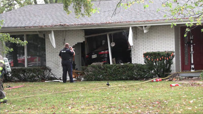 Car crashes into Spencerville home, causes minor fire