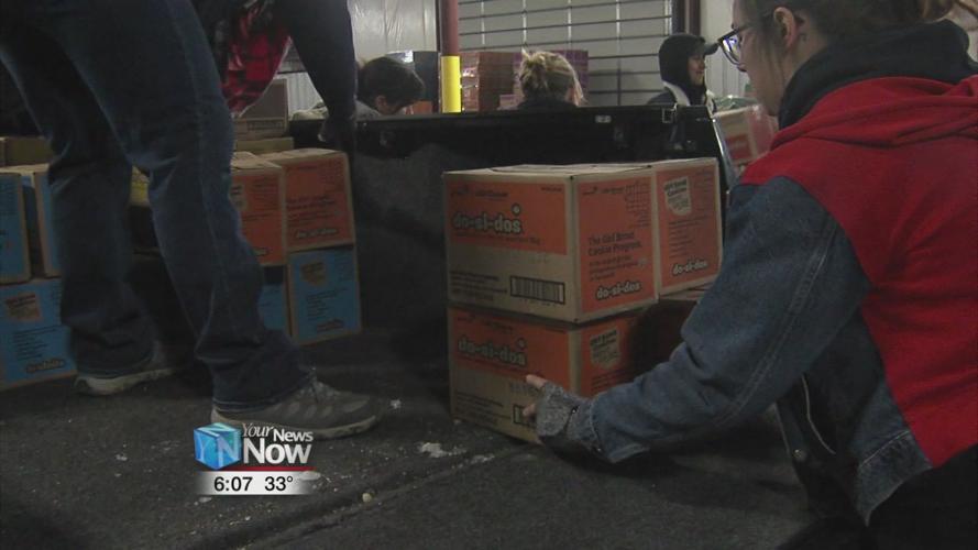 Area Girl Scouts pick up cookies for the season