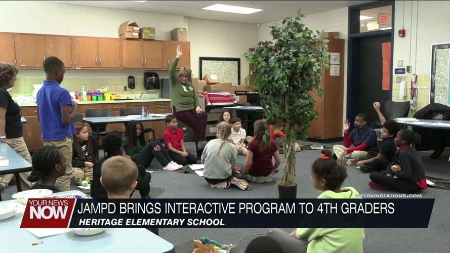 Johnny Appleseed Metro Park District visiting 4th graders to teach them about the ecosystem