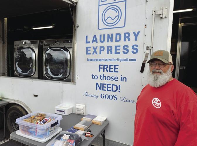 Mobile laundry for homeless spreads God's love one load at a time
