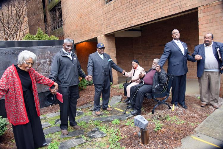 Prayer vigil lifts 60th anniversary of sitin with 4 photos Archives