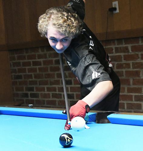 Jayce Little expertly jumps the cue ball