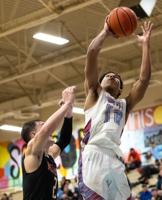 BOYS BASKETBALL | Plainsmen build healthy lead, weather final charge from Andress to advance