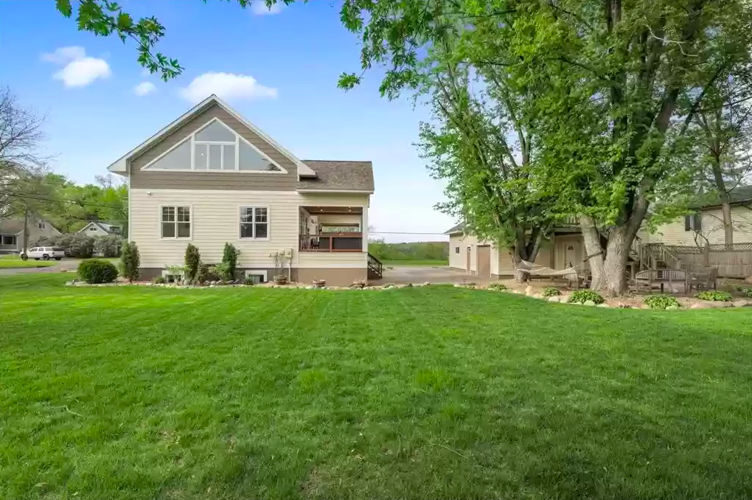 PHOTOS Mid century modern home overlooking Lake Mallalieu for sale