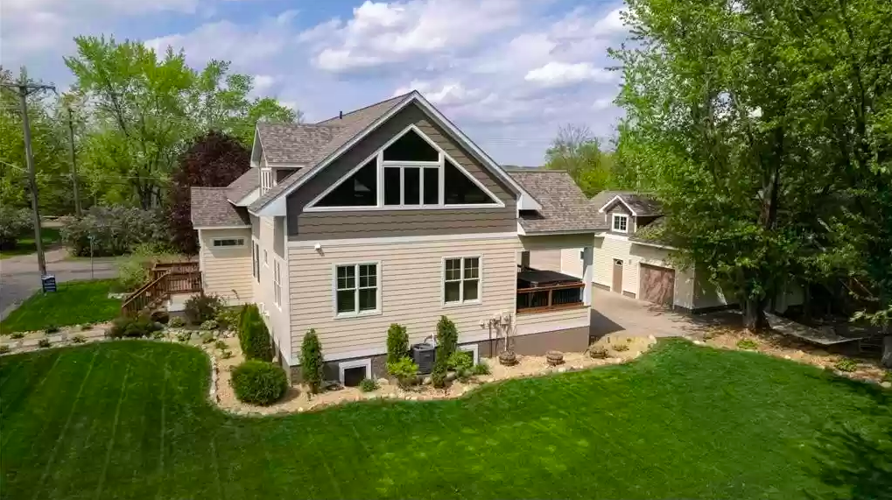 PHOTOS Mid century modern home overlooking Lake Mallalieu for sale