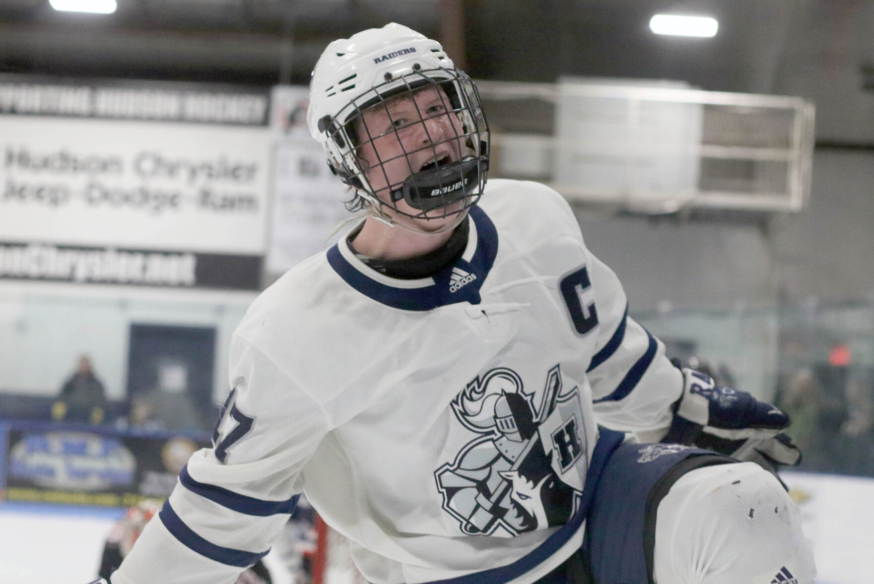 Boys hockey Strapon s four goals put Hudson into section semis