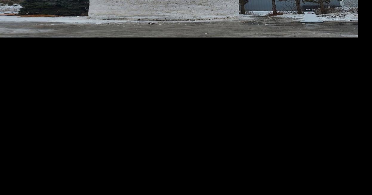 In western Wisconsin, Jeffery the Snowman reaches new heights