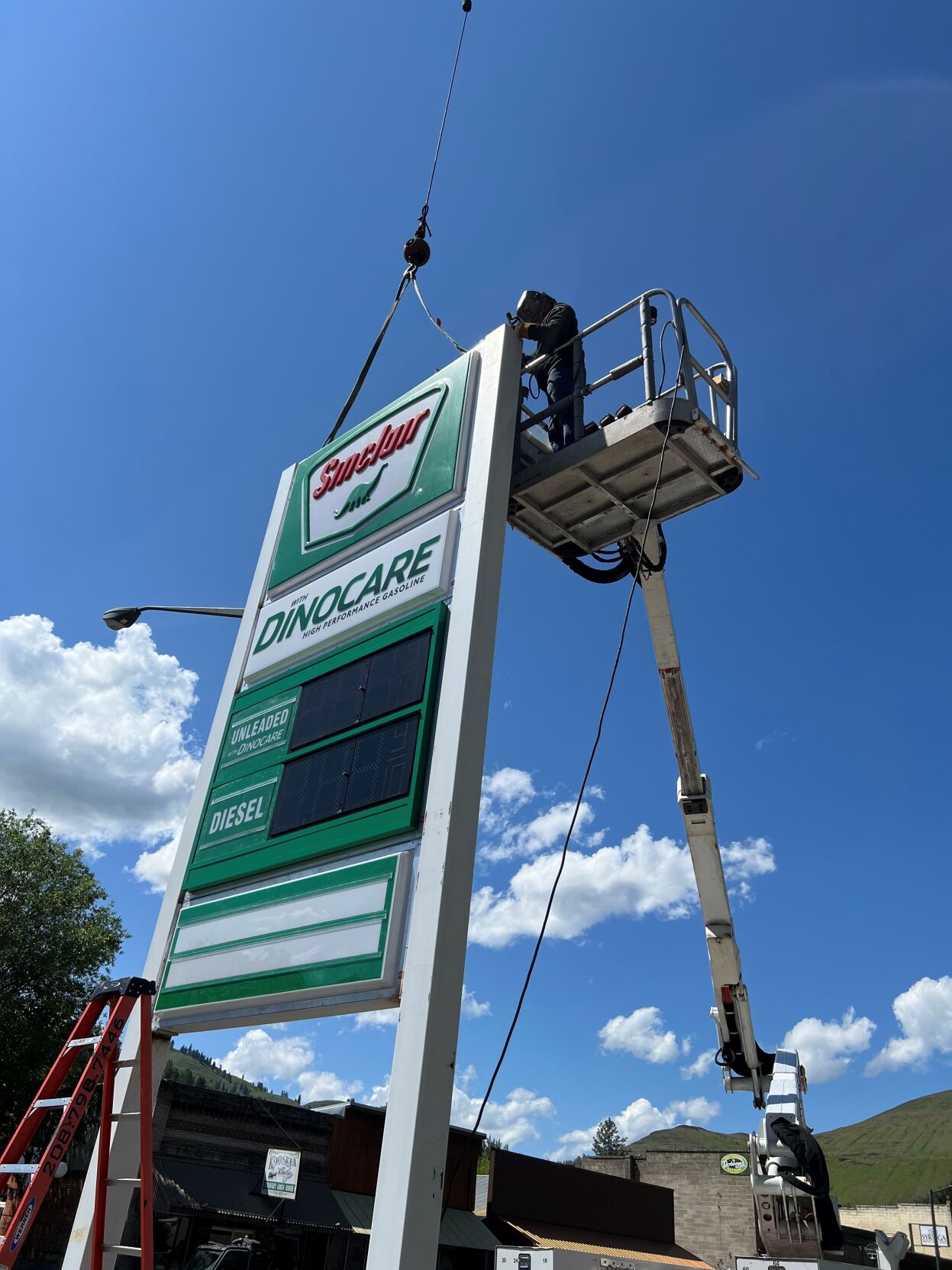 Cloninger’s Sinclair gas pumps sign in Kooskia photo