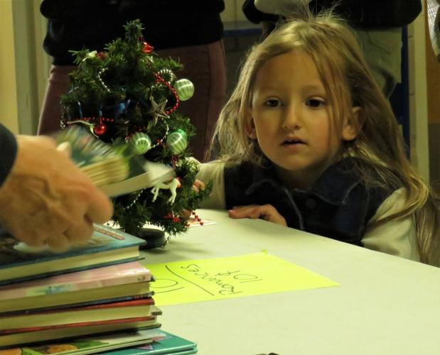 Sale moves out more than 1,000 books to community News