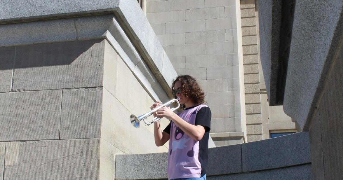 Protesting HB 822 through music; solo protester voices concerns about penalties for teachers