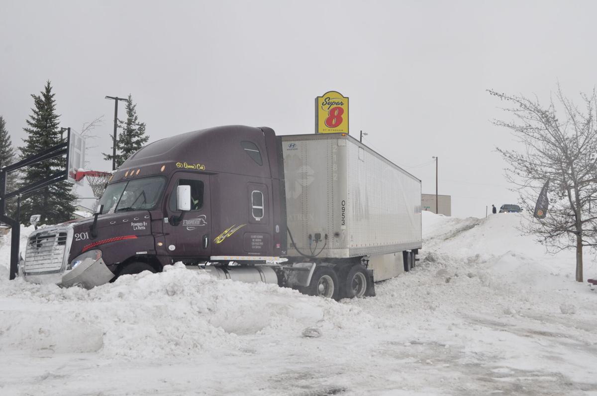 Semi-truck accident in snowstorm photo