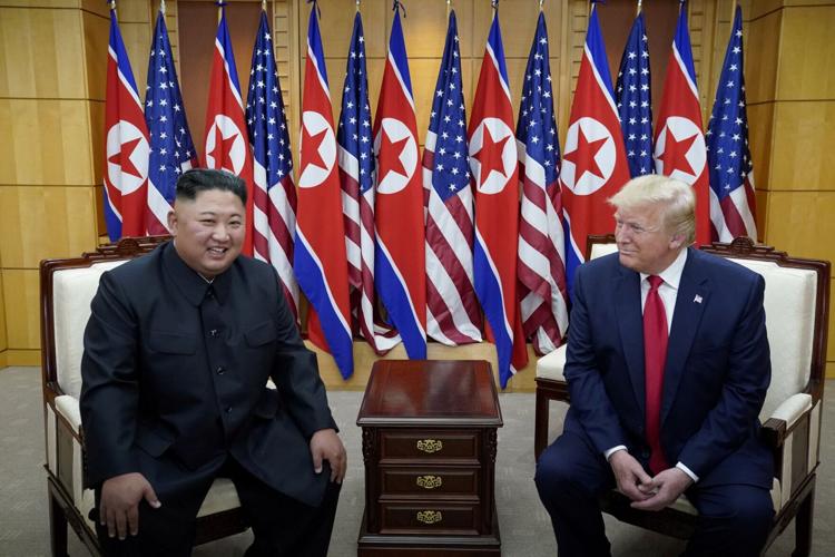 FILE PHOTO: U.S. President Trump and North Korean leader Kim Jong Un meet at the Korean Demilitarized Zone