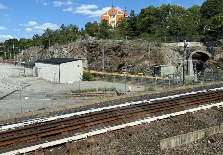 A white-coloured railway track, as seen from a metro window, in Stockholm