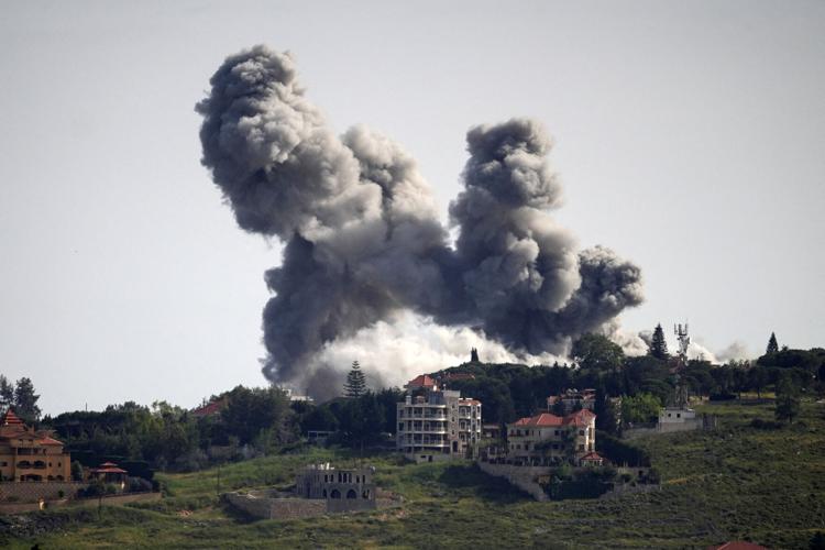 Smoke rises following an Israeli strike in Zebdin