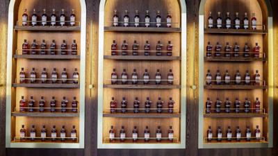 Bottles of Kentucky bourbon from Heaven Hill distillery sit on shelves at its Bardstown, KY facility.