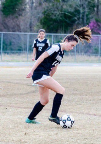 06-10 MEREDITH KIRKMAN JUMP PHOTO page 1B.jpg.jpeg