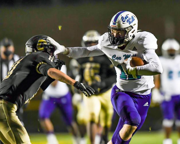 Cox Mill defeated Concord 21-20 on a botched extra point with less than a minute to play.