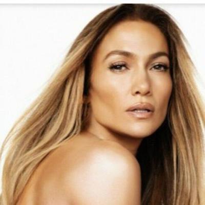 Jennifer Lopez is 'happier than ever' as she poses naked on her 53rd birthday