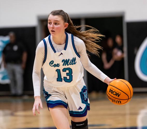 Hickory Ridge beat Cox Mill, 58 - 36