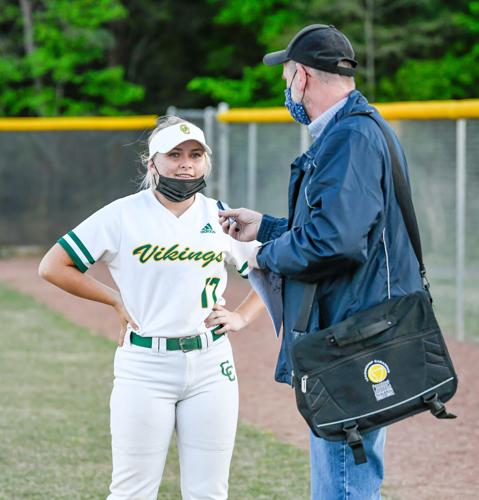 The Vikings score five runs in the last two innings to win 11-7.
