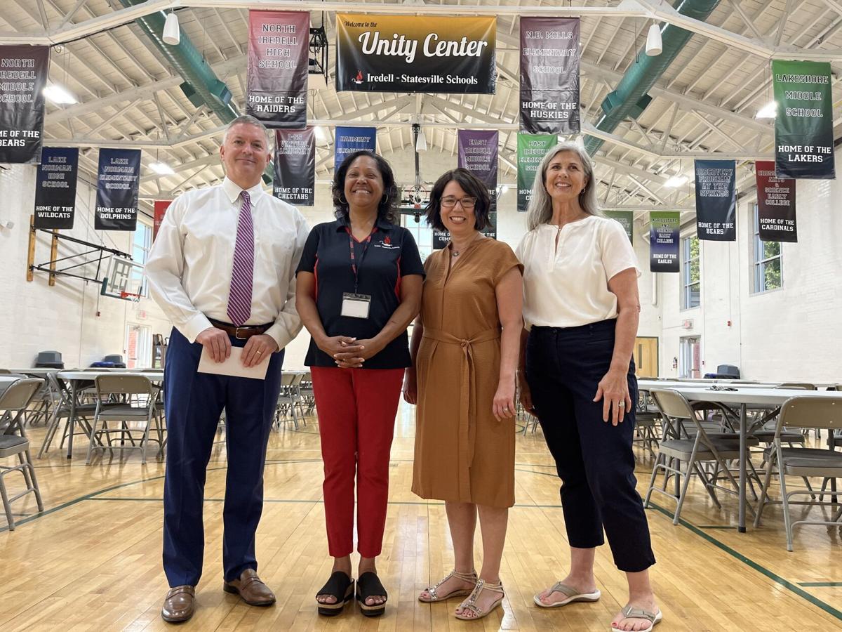 President Tim Smith, Marlene Scott, Kristen Mayle, and Sue White pose for a photo inside the Unity Center in Statesville on Tuesday.